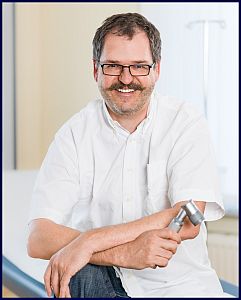 Dr. J. Thomas Kainz
